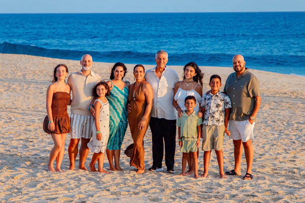 The whole crew, toes in the sand